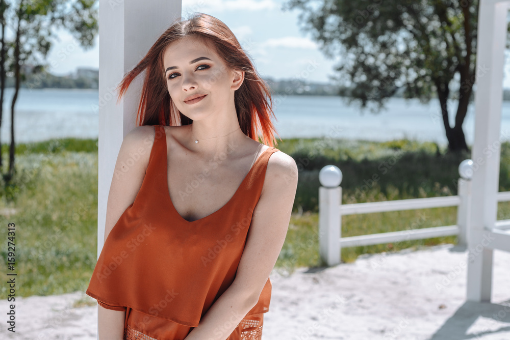Summer fashion portrait of a beautiful young woman or girl on the beach. copy space Summer fashion portrait of a beautiful young woman or girl on the beach. copy space