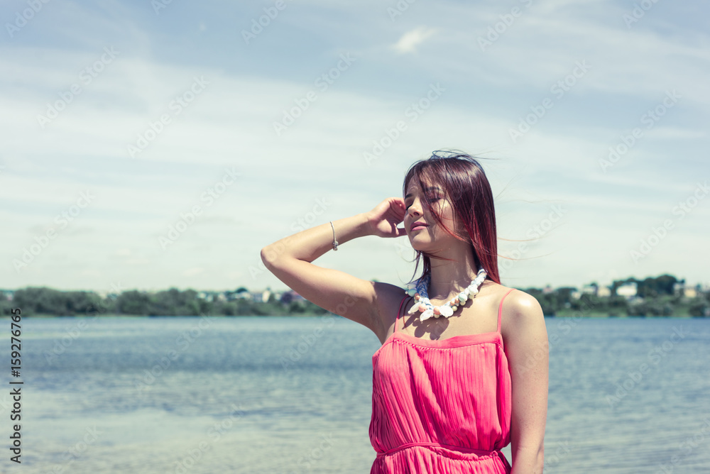 Summer fashion portrait of a beautiful young woman or girl on the beach. copy space Summer fashion portrait of a beautiful young woman or girl on the beach. copy space