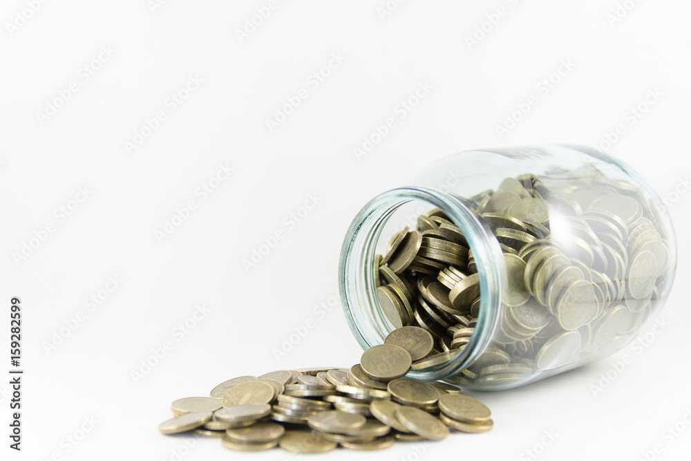 Money in a glass jar on a white background Money in a glass jar on a white background