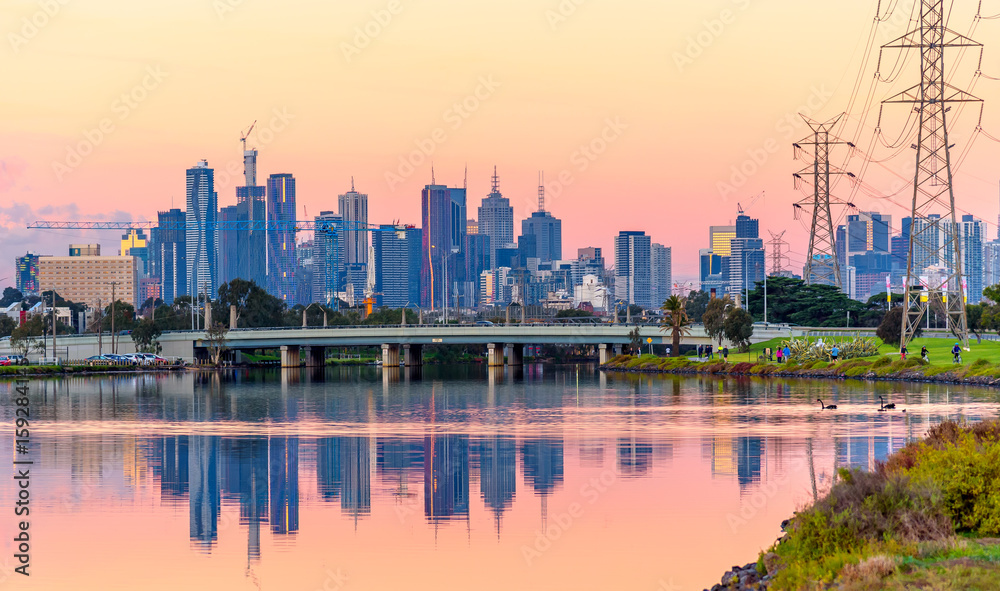 A view of the Melbourne Australia skyline from the Maribynong River in the early evening.
