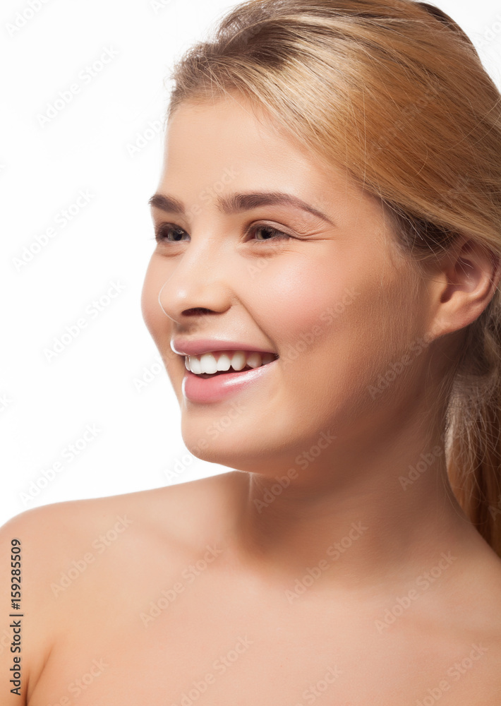Beautiful girl smiling on white background in studio photo. Perfect white teeth Beautiful girl smiling on white background in studio photo. Perfect white teeth