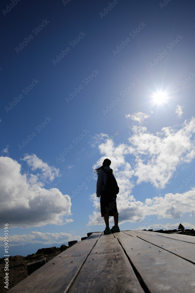 Silhouette Young woman blue sky