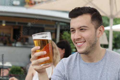 Man taking a break with a cold refreshing beer