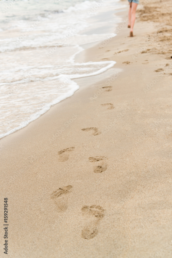 Young girl running on the beach Young girl running on the beach