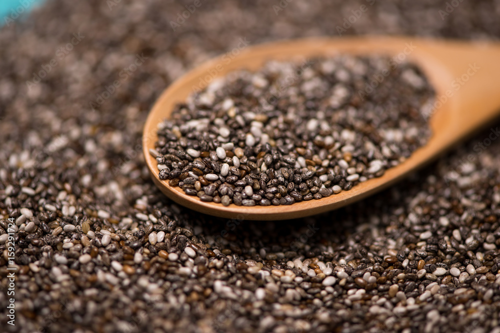 Close-up of ealthy chia seeds in a spoon. Text space. Close-up of ealthy chia seeds in a spoon. Text space.