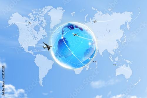 earth on blue sky with plane