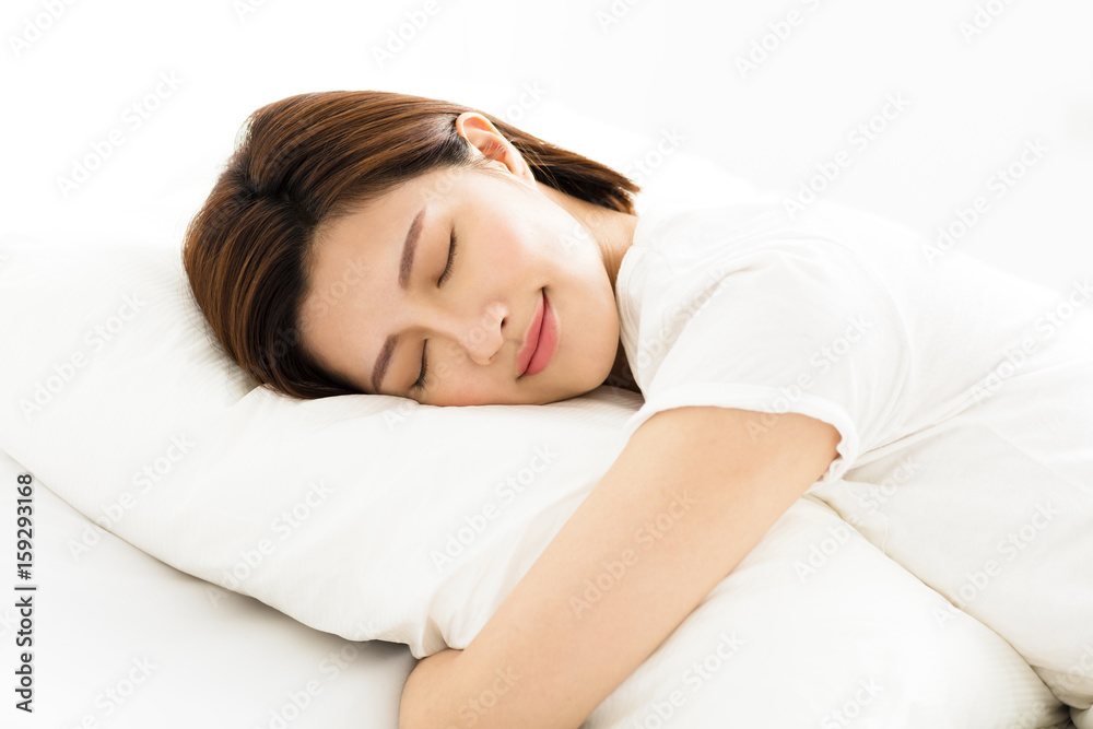 beautiful young woman sleeps in the bedroom. beautiful young woman sleeps in the bedroom.