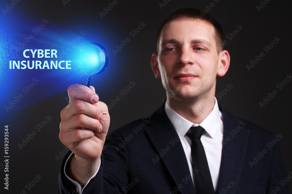 The concept of business, technology, the Internet and the network. A young entrepreneur working on a virtual screen of the future and sees the inscription: Cyber insurance The concept of business, technology, the Internet and the network. A young entrepreneur working on a virtual screen of the future and sees the inscription: Cyber insurance
