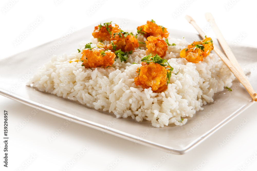 Chicken nuggets with rice on white background Chicken nuggets with rice on white background