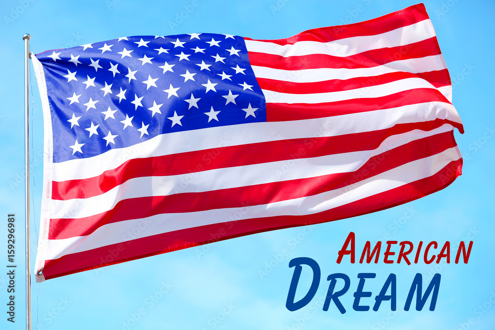Ruffled American flag on blue sky background. Ruffled American flag on blue sky background.