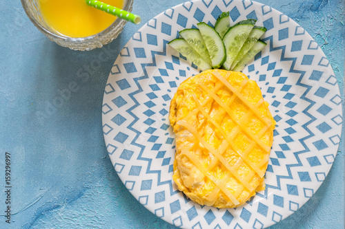 Breakfast for kids - omelette look like pineapple