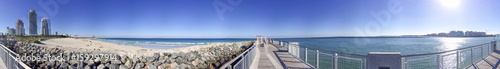 MIAMI BEACH  FL - FEBRUARY 2016  Tourists along the ocean. The city is a major attraction in Florida