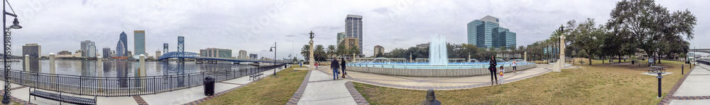 JACKSONVILLE, FL - FEBRUARY 2016: Tourists walk along city streets. The city is a major attraction in Florida