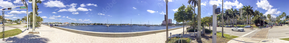 WEST PALM BEACH, FL - FEBRUARY 2016: Tourists along city river. The city is a major attraction in Florida