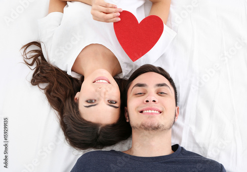 Beautiful young couple with...