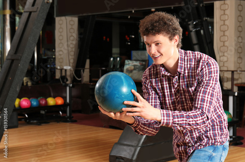 Young man having fun in bow...
