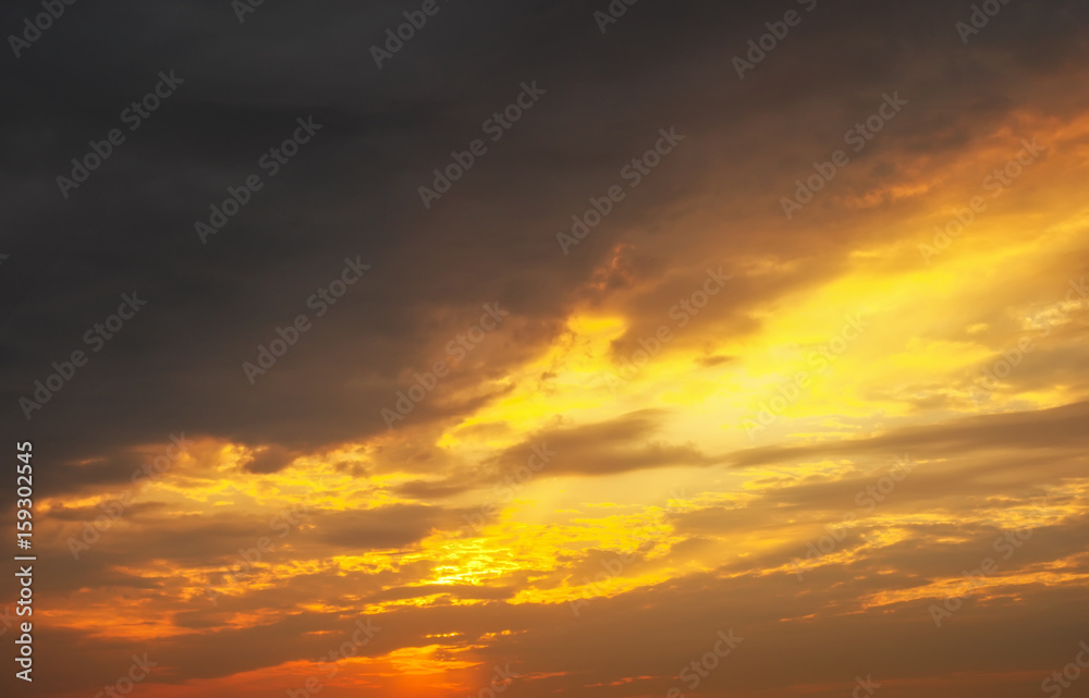 Fototapeta premium Fiery, orange and red colors sunset sky as background