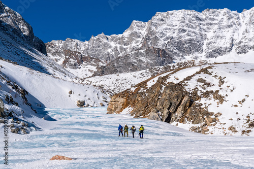 A group of tourists goes to climb Munku-Sardyk mount © tilpich