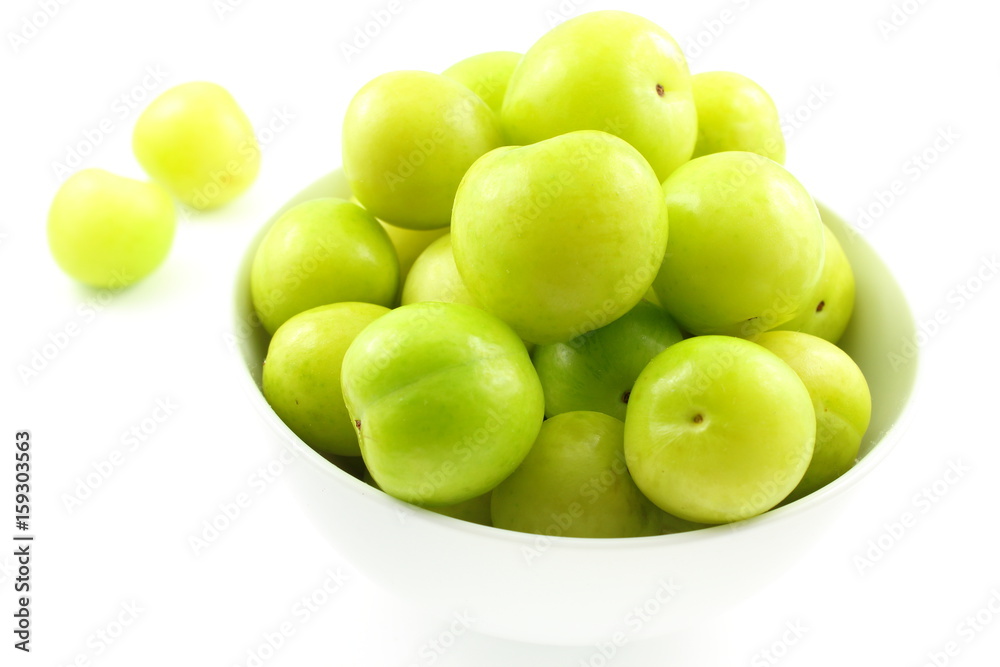 fresh turkish can erik plum fruits in a small white bowl fresh turkish can erik plum fruits in a small white bowl