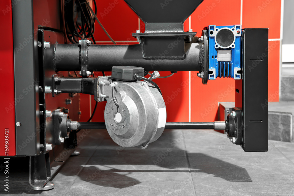 Fototapeta premium Part of solid fuel boiler, close up. Energy savings concept