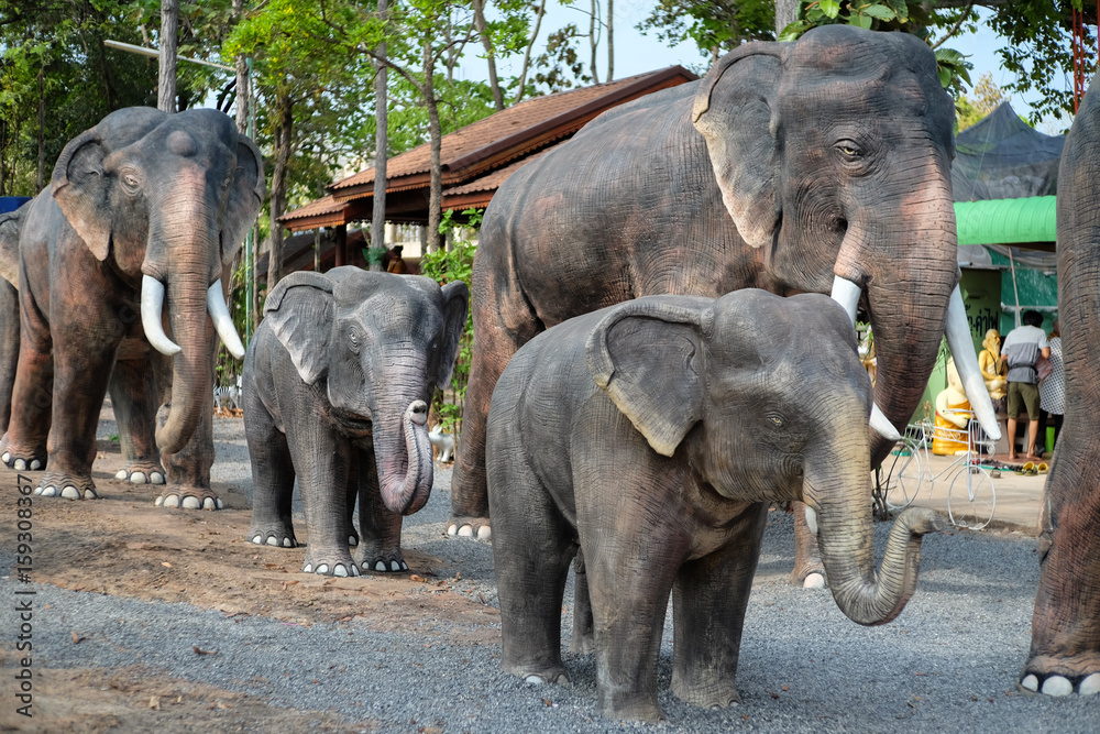 Fototapeta premium Elephant statue at Spirit house, It's a shrine to the spirit that protects the general area of an establishment, usually found in Southeast Asian countries 