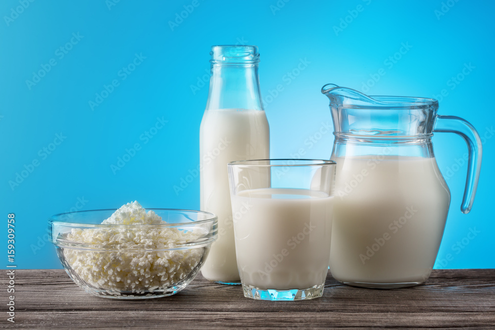Breakfast with useful dairy products on wooden table Breakfast with useful dairy products on wooden table
