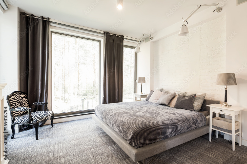 Fototapeta premium Avant-garde, bright bedroom