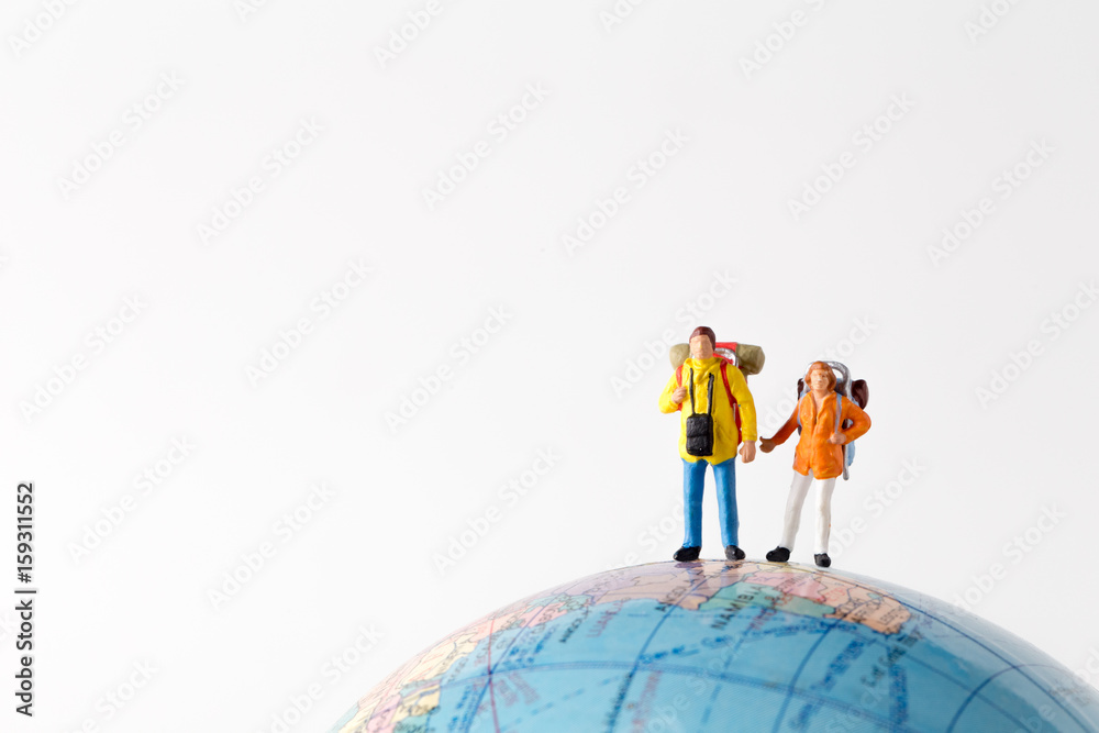 Miniature model couple traveller model standing together, people travel in concept, isolatrd on white background. Miniature model couple traveller model standing together, people travel in concept, isolatrd on white background.