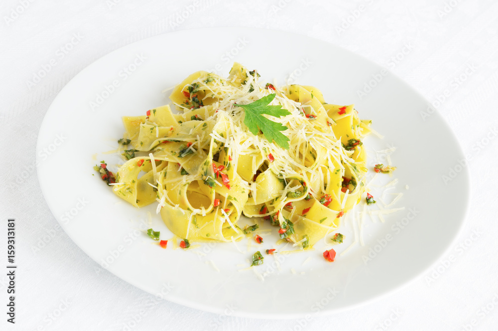 pasta with garlic, pepper, green onions, and parsley sprinkled with parmesan pasta with garlic, pepper, green onions, and parsley sprinkled with parmesan