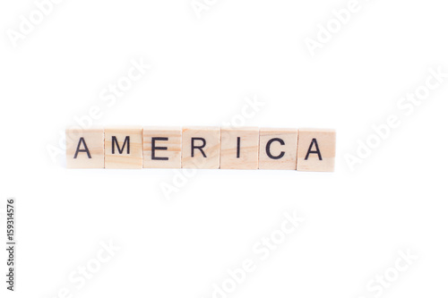 AMERICA word on square tile concept isolated on white background