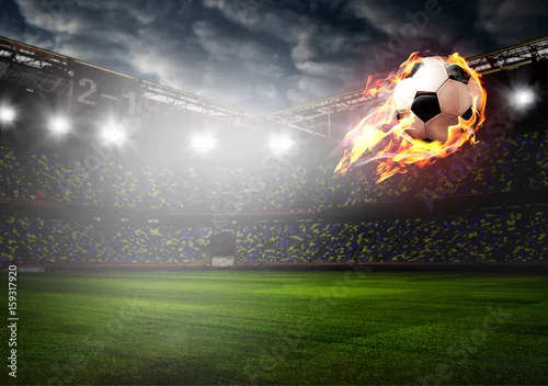 Obraz Piłka nożna lub piłka nożna piłka w ogniu na stadionie