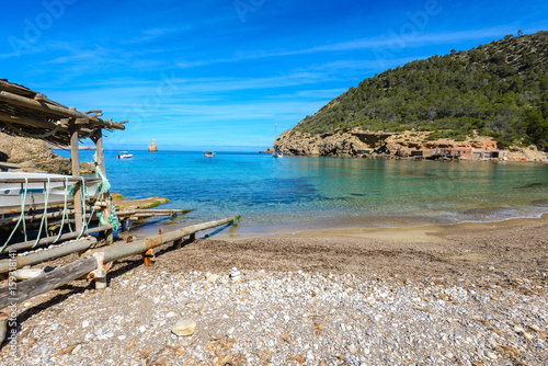 Benirras beach with fishermen's huts, Ibiza island, Spain