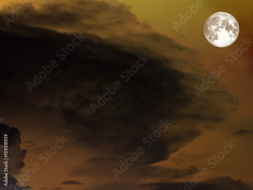 super moon and heap dark cloud in night sky
