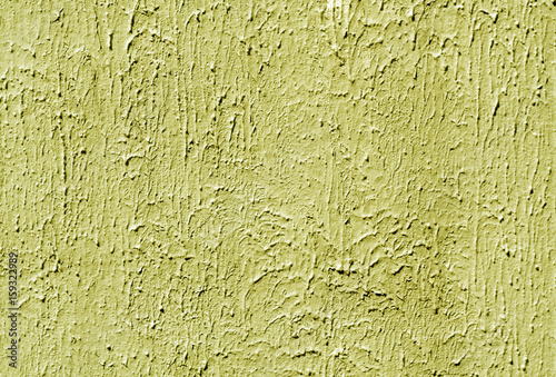 Yellow color plaster wall pattern.