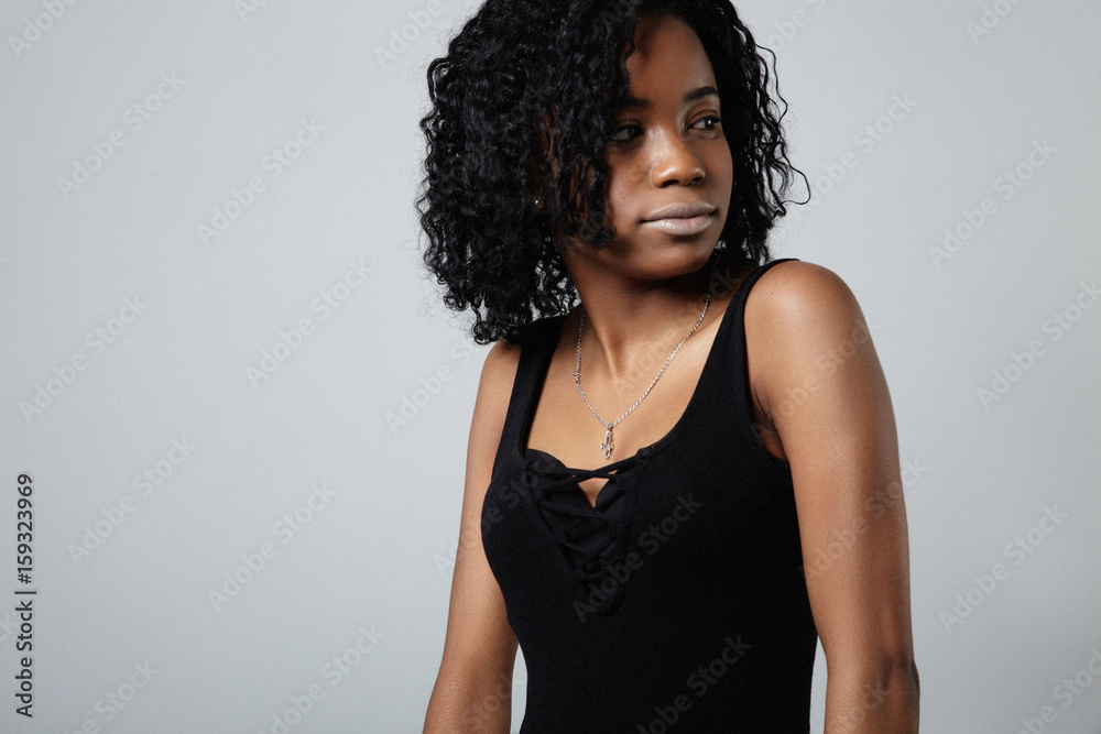 young black mixed race woman, with short curly hair portrit young black mixed race woman, with short curly hair portrit