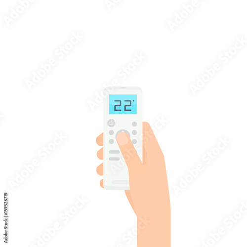 Hand holding air conditioner remote control