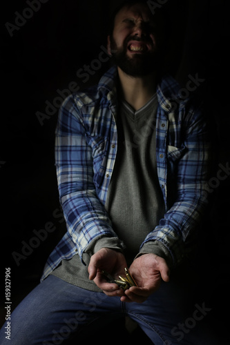 bullet in hands man © alexkich