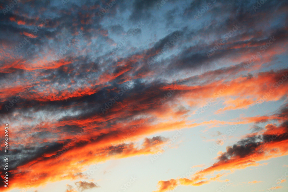 Abstract natural background with a celestial cloudy landscape at sunset Abstract natural background with a celestial cloudy landscape at sunset