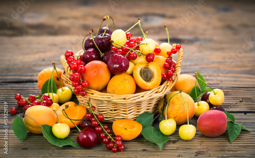 Fototapeta Naklejka Na Ścianę i Meble -  Fresh summer fruits in the basket