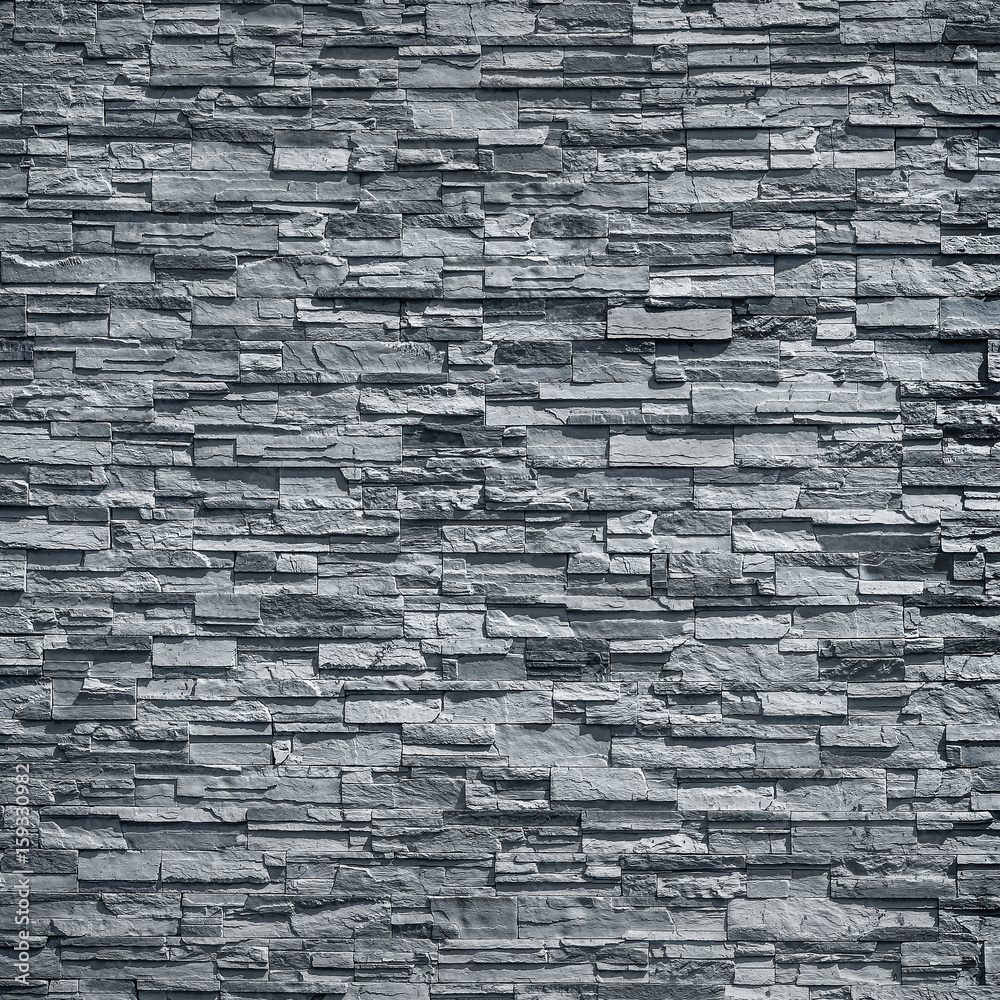 Fototapeta premium pattern of decorative black slate stone wall surface / black stone