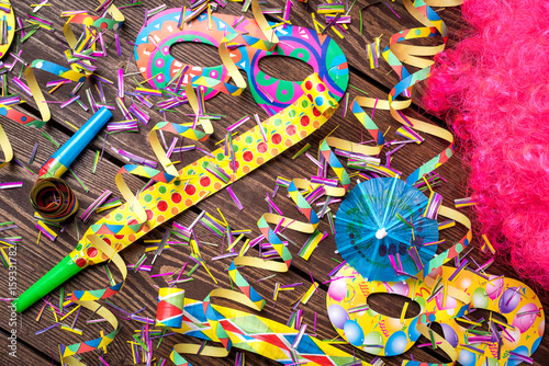 Colorful party background on wooden table