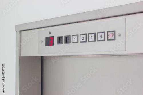 close-up dumbwaiter lift elevator in a kitchen