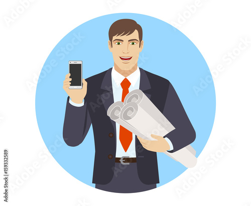 Businessman holding the project plans and showing mobile phone