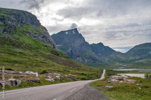 Sea coast road under high mountains - Lofoten, Norway