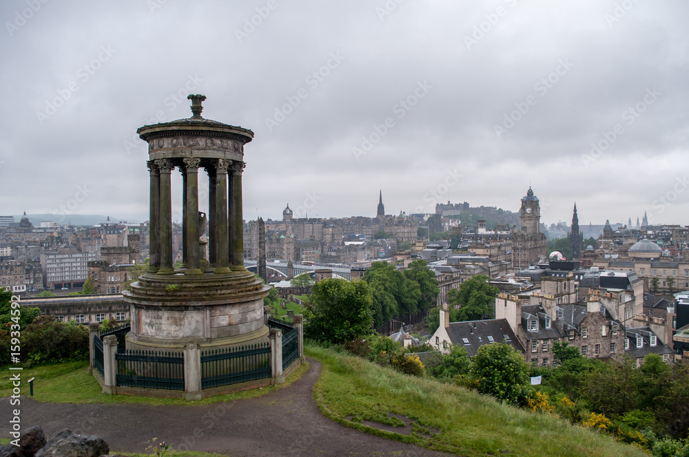 View of Calton Hill over the city of Edinburgh in Scotland.