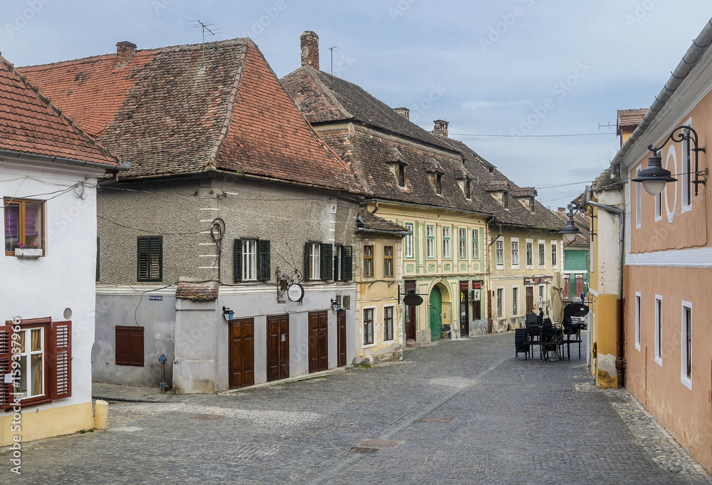 A glimpse of the Turnului Road in the historic center of Sibiu, Romania, in a moment of tranquility A glimpse of the Turnului Road in the historic center of Sibiu, Romania, in a moment of tranquility