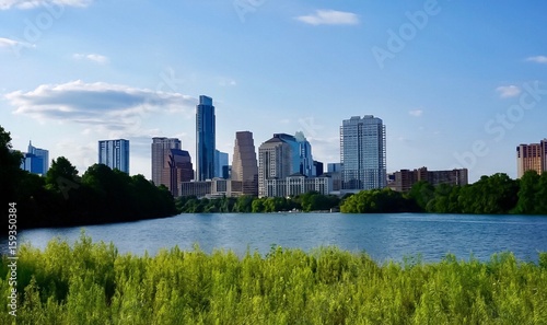 A skyline view of downtown Austin Texas from the boardwalk on Lady Bird Lake © jfortner2015