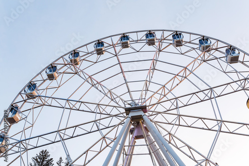Modern Ferris Wheel detail Over Blue Sky