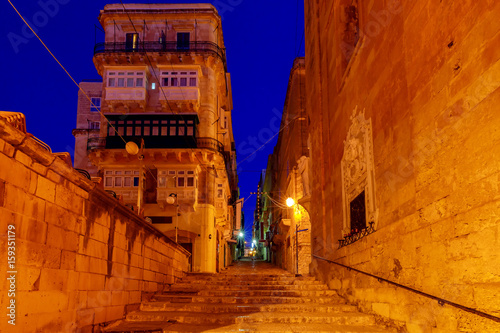 Valletta. Old medieval street at night. © pillerss