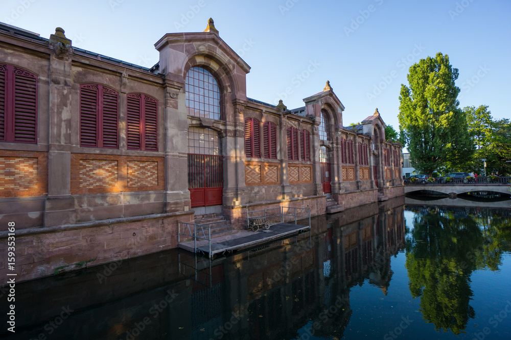 Reflecting ancient building of little venice in Colmar